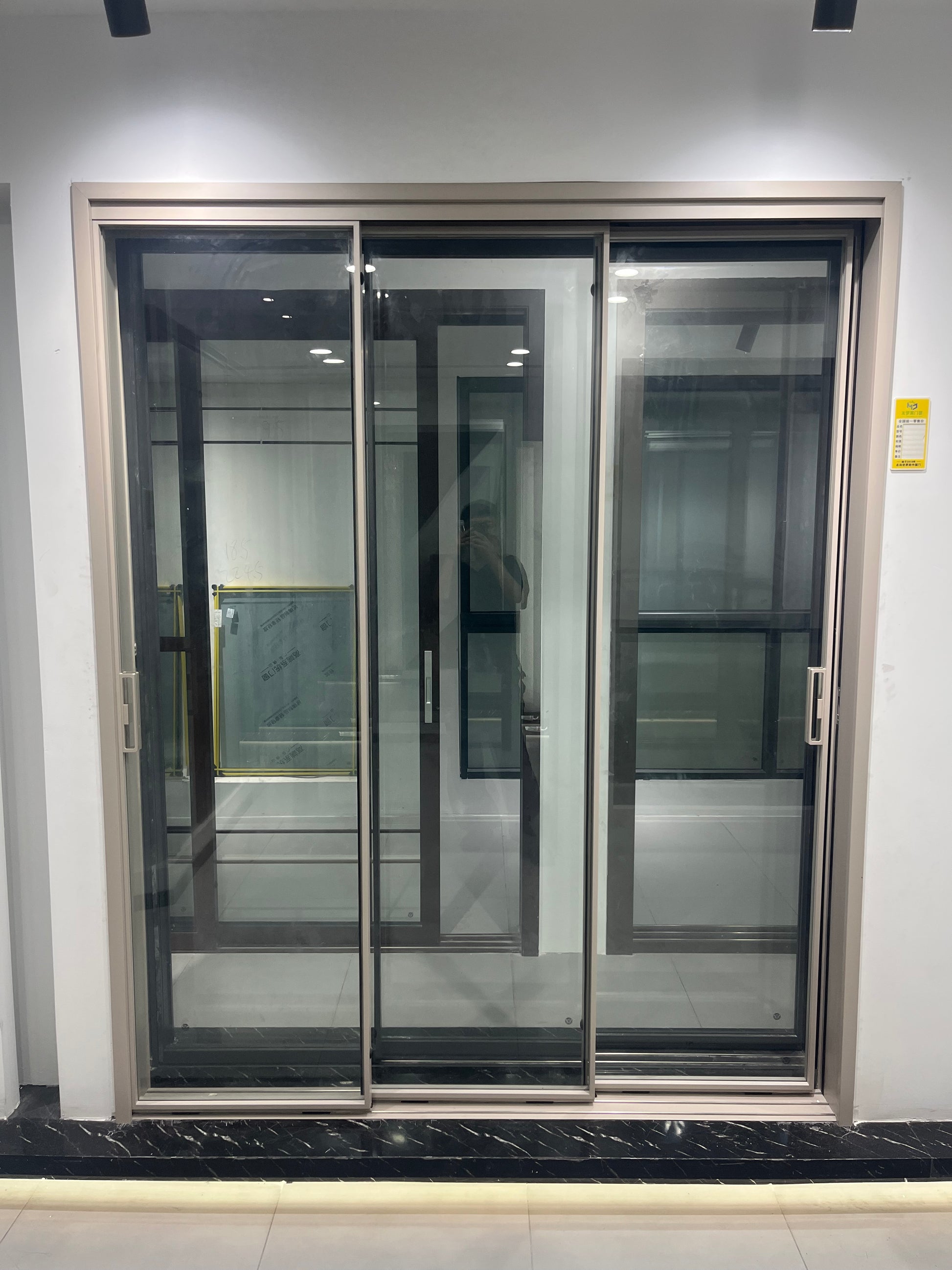 Installed Ultimate Series three-track sliding door