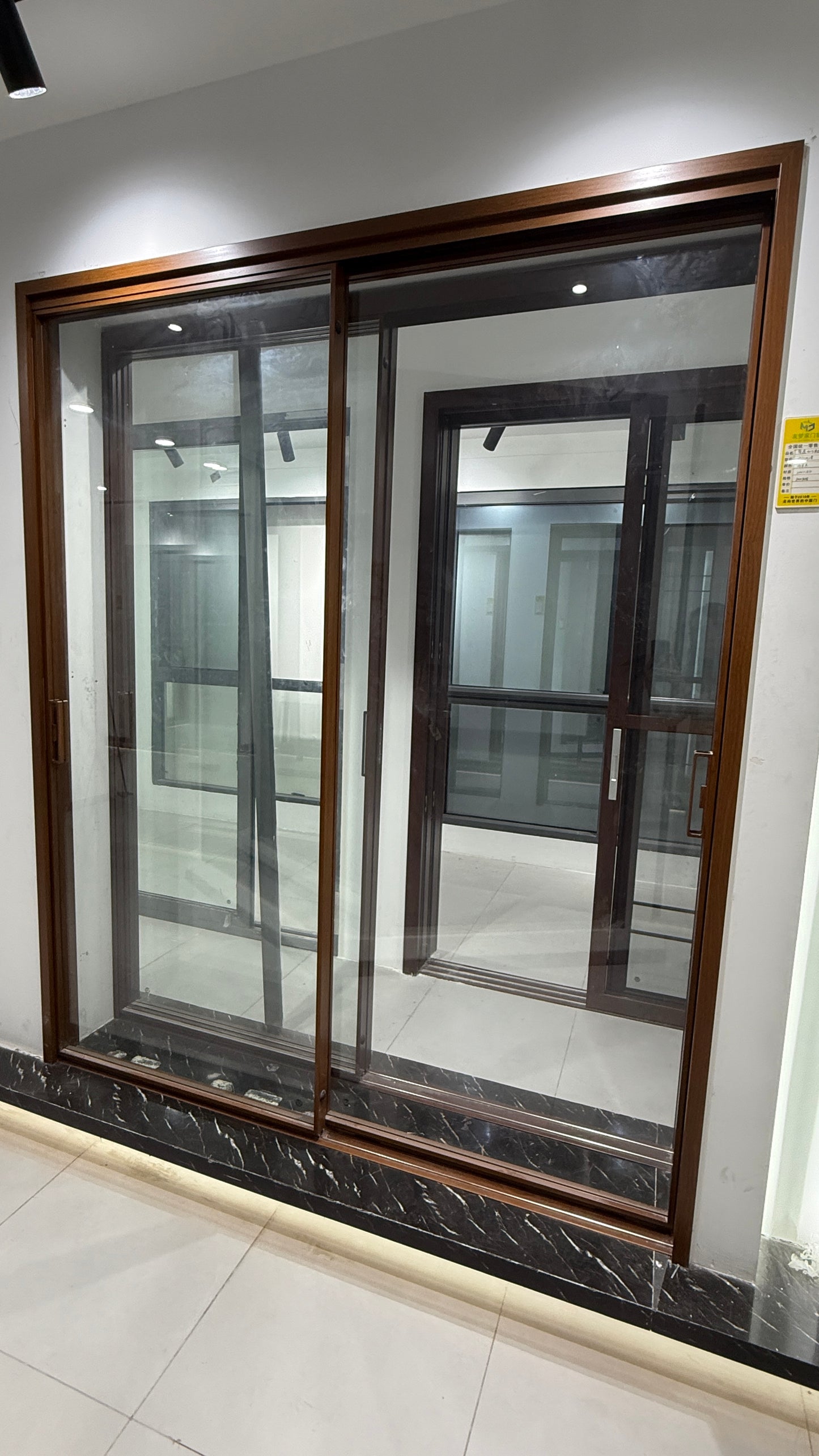 Installed woodgrain two-panel sliding door